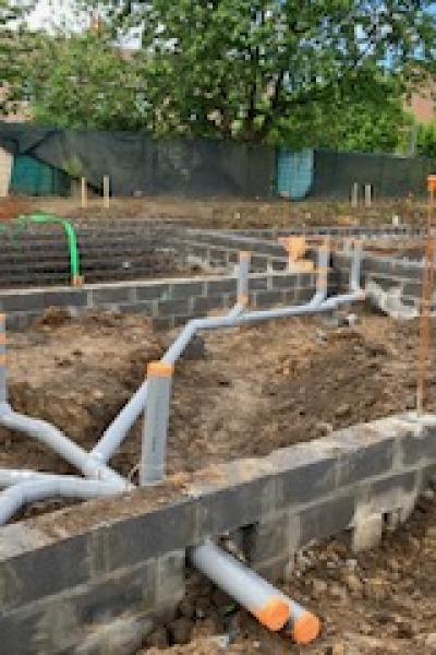 chantier de tubesévacuation pvc sous dalle